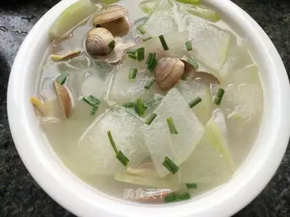 Yellow clam and melon soup