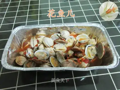 A tin cardbox of gold and mushroom clams