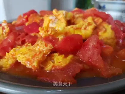 Tomato fried duck eggs