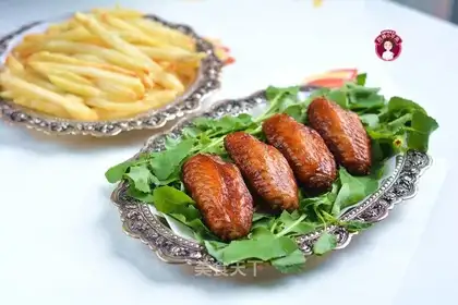 Air fried chicken wings and fries
