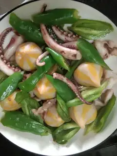 Two fresh spicy peppers