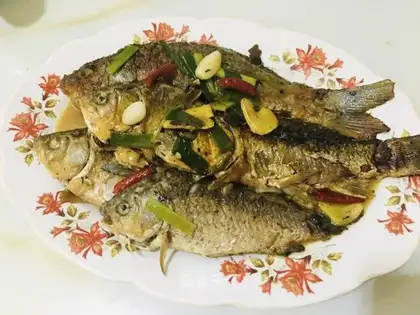 Farmer stews fish