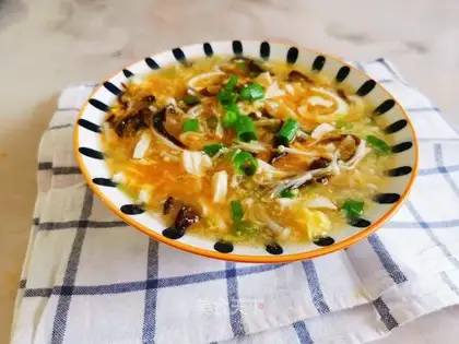 Gold needles, tofu soup