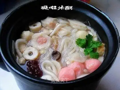 Mushroom soup with double flour fish balls