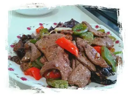 Stewed pork liver with colorful peppers