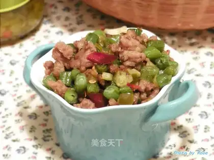 stir-fried minced pork with sour cucumber and green beans