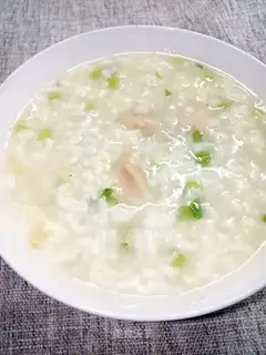Celery pork porridge