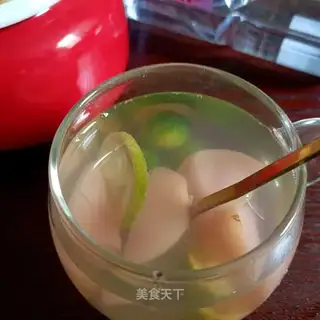 An orange can of ice water