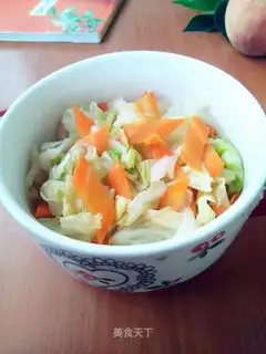 A cabbage with carrots