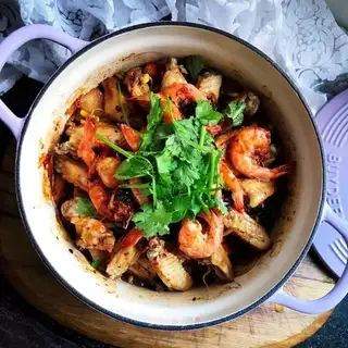 Three-juice chicken fin shrimp pan