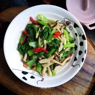 The greens make the mushrooms