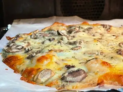 Seafood mushroom pizza