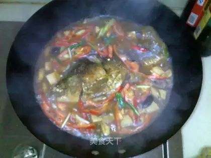 Spicy crucian carp and tofu soup