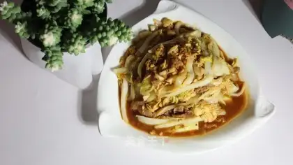 Eggs and cabbage with fried meat