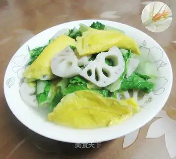 The egg dumplings are cooking the cauliflower