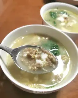 Meat and eggs and truffle soup