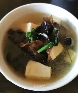 Tofu, black mussel soup