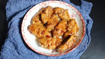 The chicken in the sauce