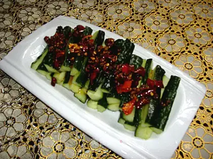 Pour oil on cucumber