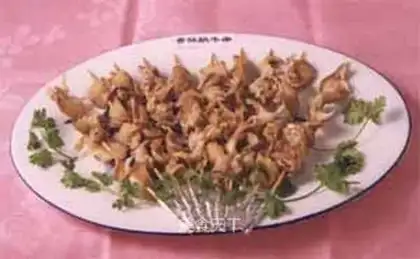 Crispy snail skewers