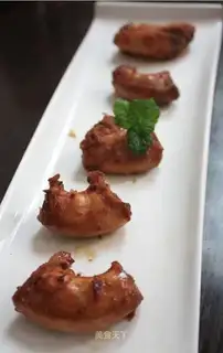 Finger sucking roasted chicken neck