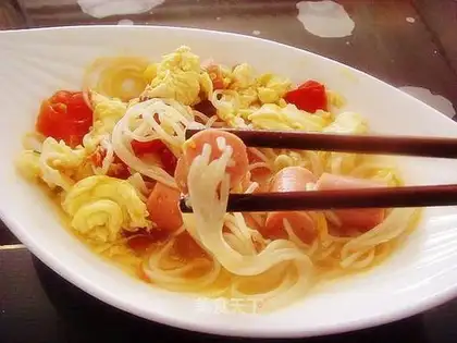Sausage through noodles