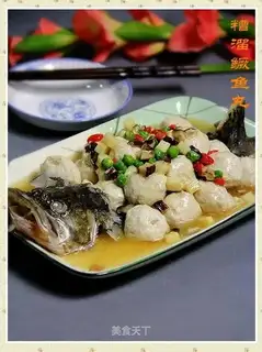 Sizzled mandarin fish meatballs