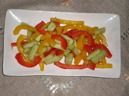 Mixed colorful peppers with skillful hands