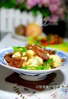 Fried cauliflower with spicy sausage