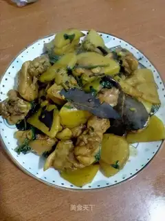 Cooked chicken wings and potatoes