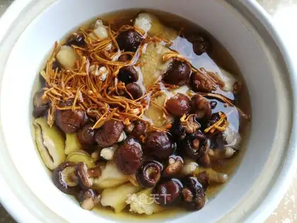 Worm and herbs and chicken soup