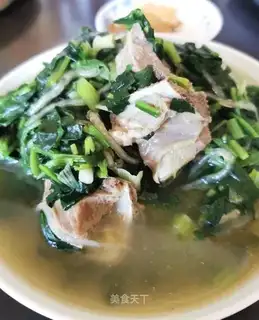 A spinach pastry curry bone