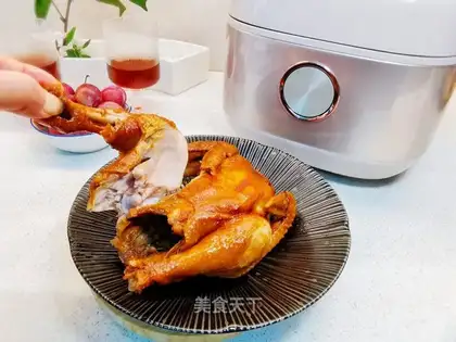 A chicken with a pan