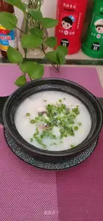 Scrambled black fish porridge
