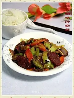 stir-fried vegetables with soy sauce and cured meat
