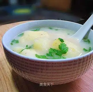 Crucian carp, pork and potato soup