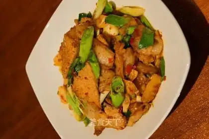 Twice-cooked pork with garlic sprouts