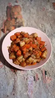 Five flowers with red carrots