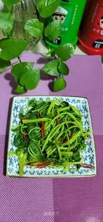 Hot peppers and cabbage leaves