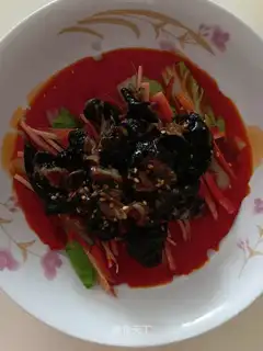Black chicken claws with red oil