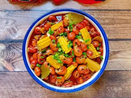 Spicy shrimp tails burning corn