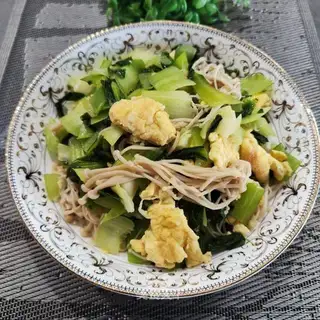 Eggs and green mushrooms