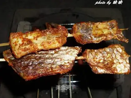 Grilled fish and roast duck fin