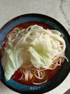 Red soup and vegetable noodles