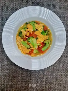 Tomato eggs and blue flowers