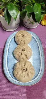 Pork, plum, whole wheat bun