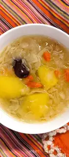 A silver spoon of apple date