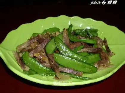 fried sausage with peas