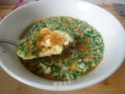 Steamed egg custard with celery leaves