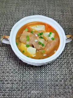 Tomato tofu fat cow soup